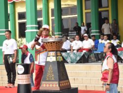 Pemerintah Kabupaten Aceh Tamiang Menyelenggarakan Upacara Kirab Obor Api Pekan Olahraga Nasional (PON) XXI