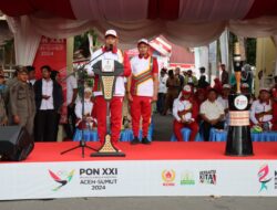 Kirab Api PON XXI Aceh-Sumut Tiba Di Aceh Tengah Ribuan Warga Padati Kota Takengon